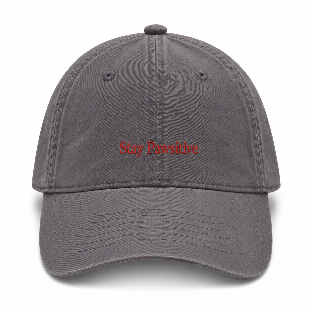 A washed cotton baseball cap embroidered with Stay Pawsitive in red