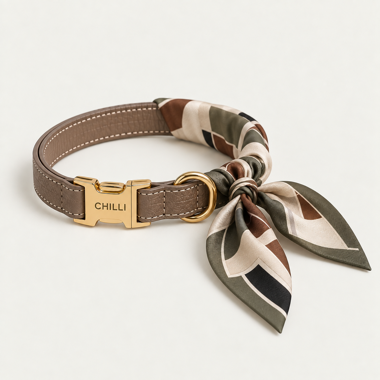 Wimbledon Collar in pebbled brown leather with a gold quick-release buckle and removable silk scarf