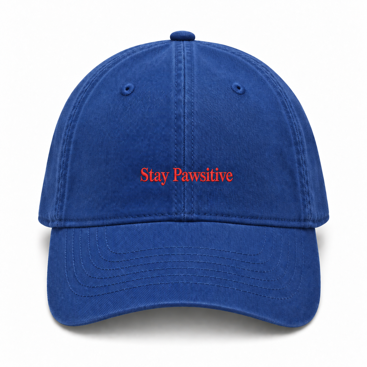 A washed cotton baseball cap embroidered with Stay Pawsitive in red