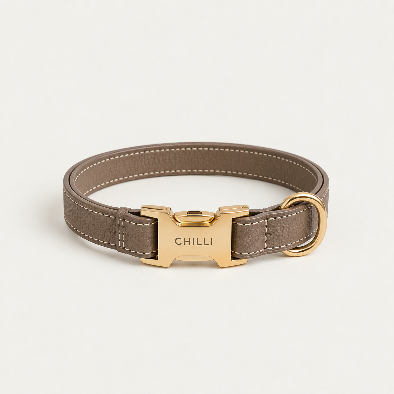 Wimbledon Collar in pebbled brown leather with a gold quick-release buckle and removable silk scarf