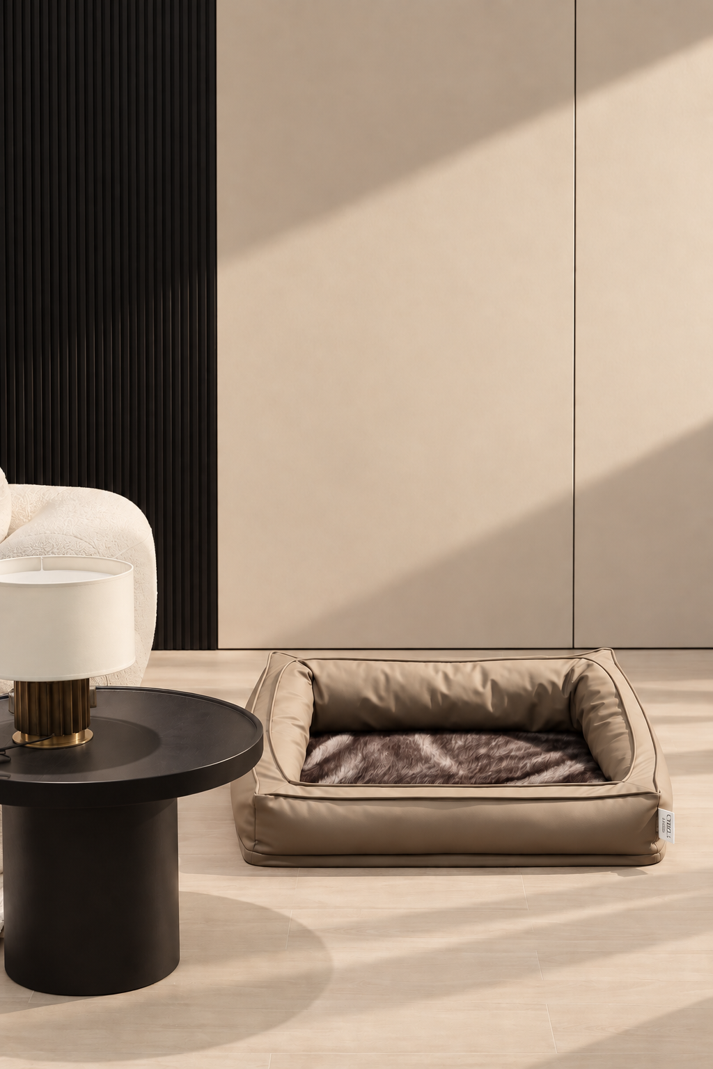 Mayfair Lounge Bed in a warm neutral finish with a dark mink-style cushion